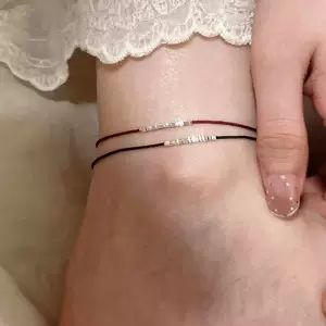 دستبند و انگشتر زنانه با طرح نقرهای و نخ قرمز، طراحی خاص و شیک، سبک چینی مدرن، مناسب عمدهفروشی